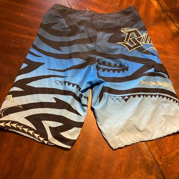Billabong Blue and Black Board Shorts with Tribal Patterns - Picture 3 of 5